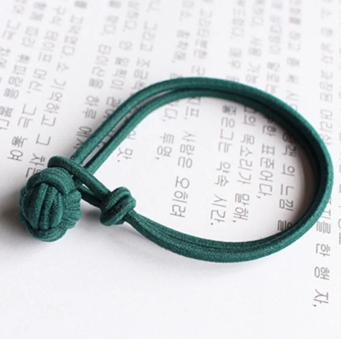 Green hair tie elastic band with knot ball detail stretchy ponytail holder