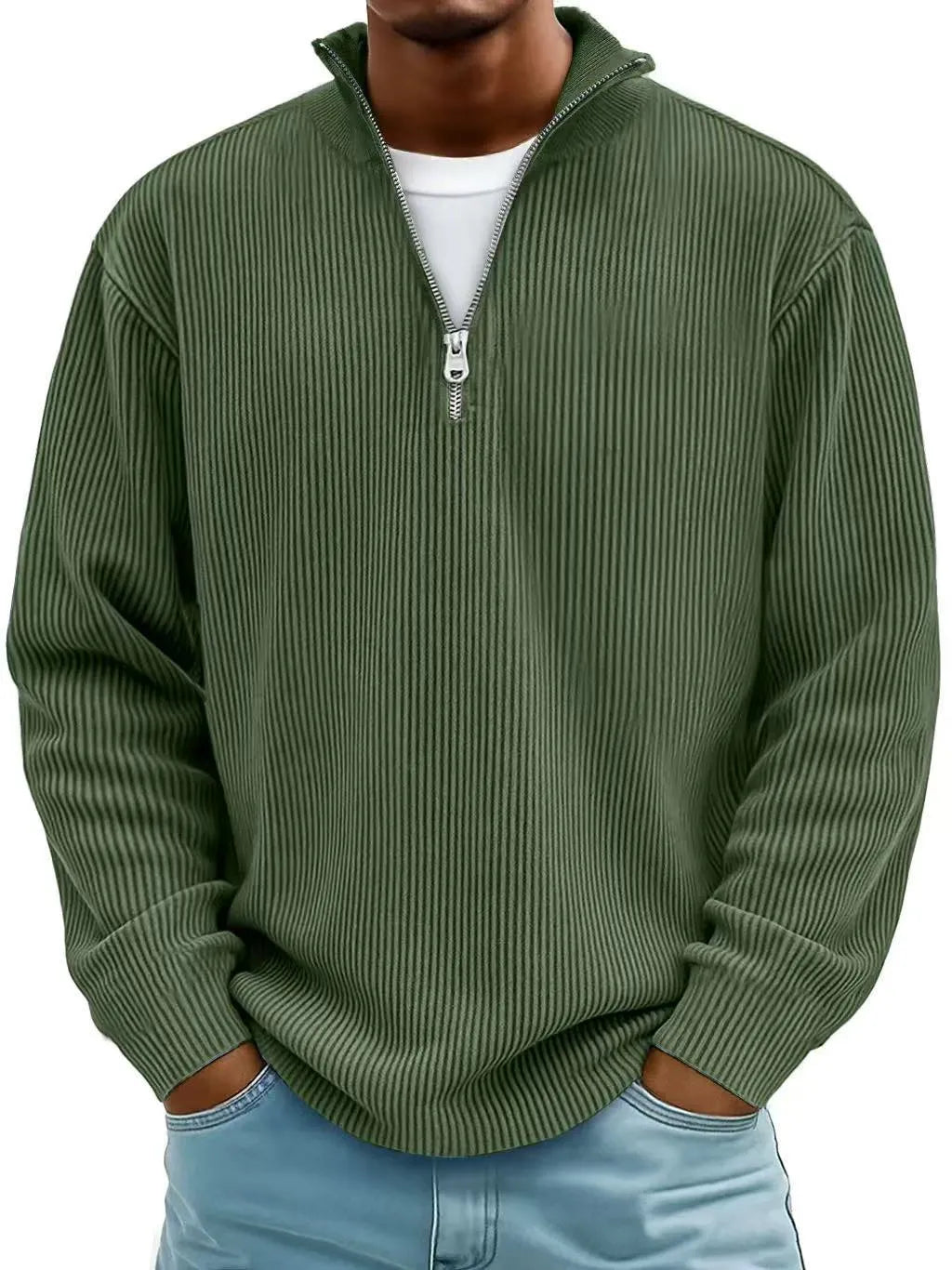 Green ribbed sweater worn by a person on a white background