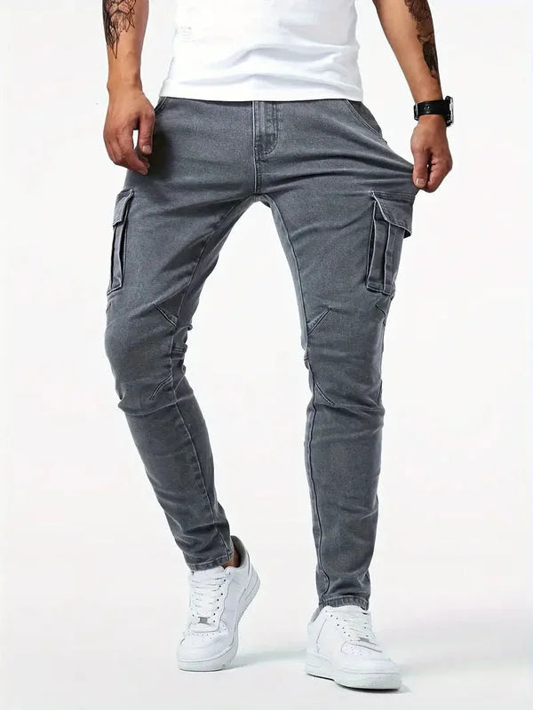 Grey men's casual cargo pants with side cargo pockets and slim tapered fit