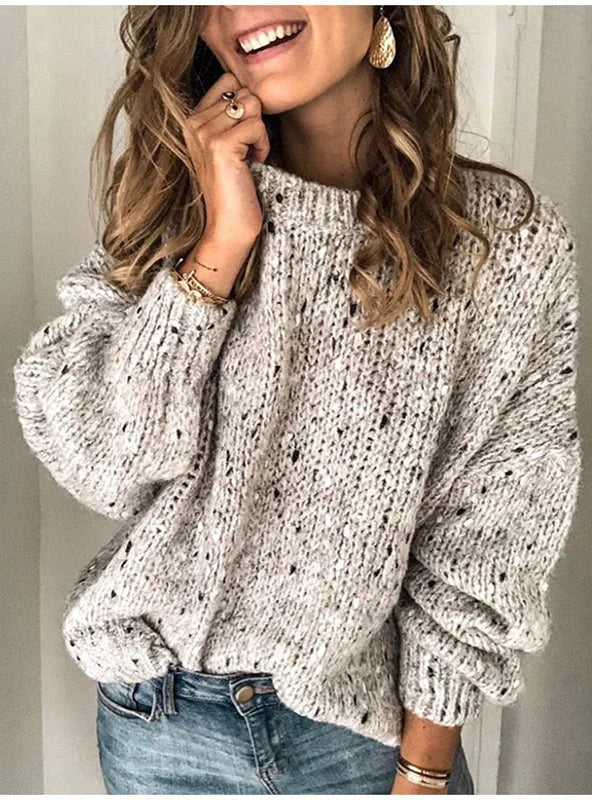 Grey polka-dot knitted sweater for women shown in a relaxed everyday outfit