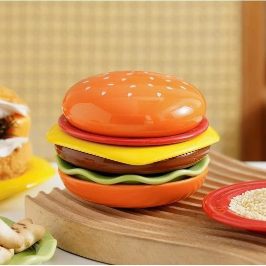 Hamburger ceramic bowl set stacked together on wooden counter