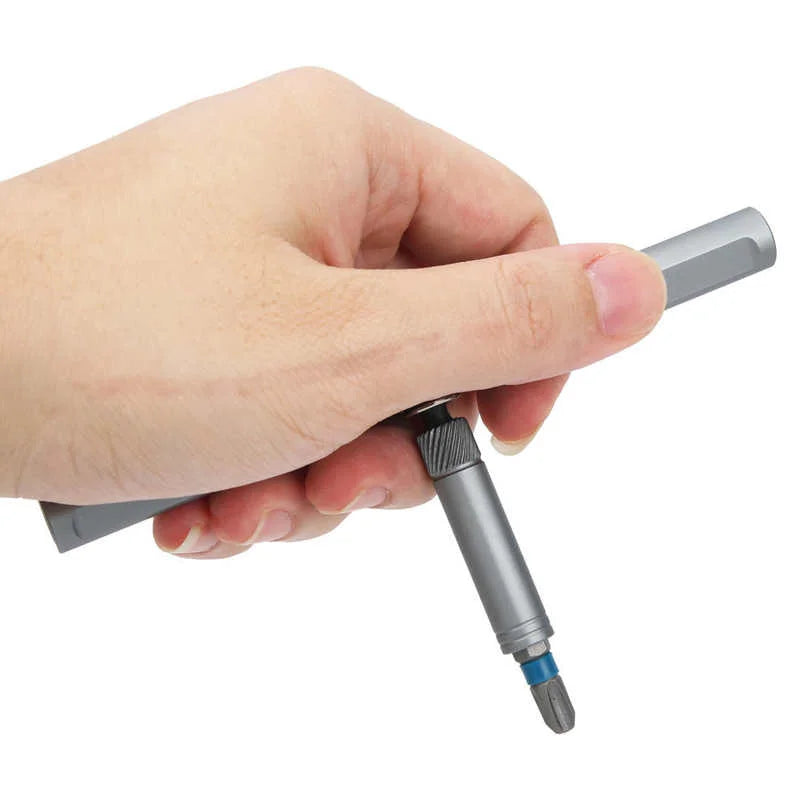 Hand holding T-handle ratchet screwdriver demonstrating grip and control