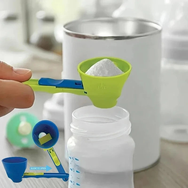 Hand holding blue and green protein powder scoop with funnel pouring into baby formula bottle mess-free kitchen