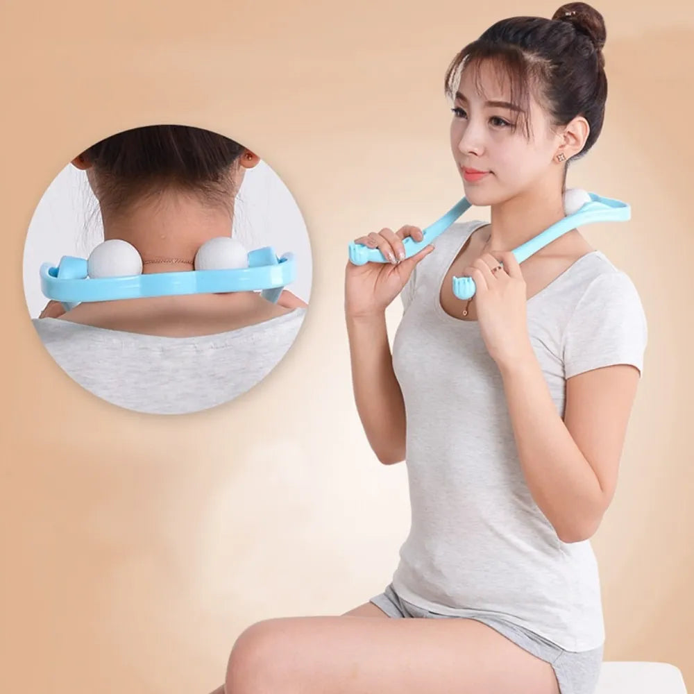 Handheld neck and shoulder massager demonstrating use on upper back