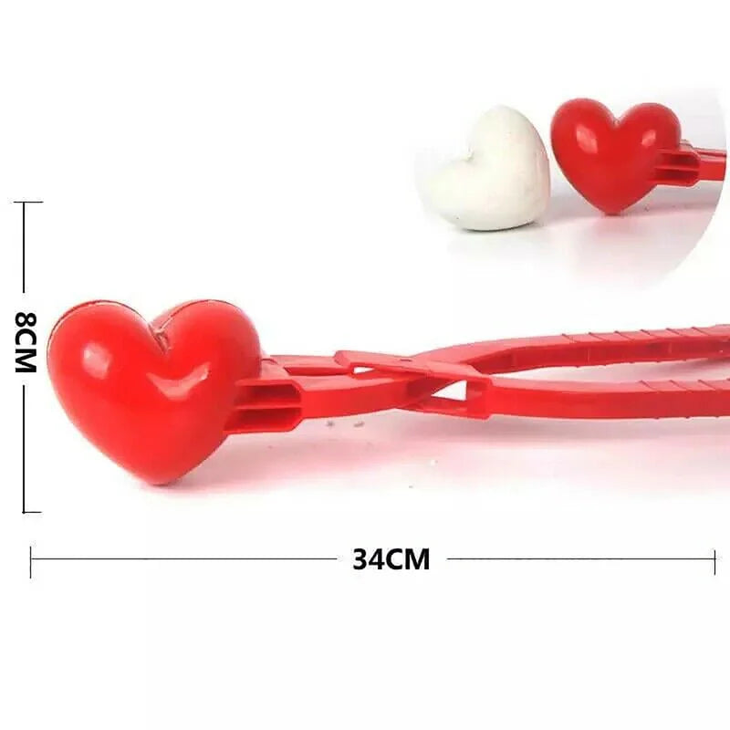 Heart-shaped red snowball clip mold with size measurement shown on white background