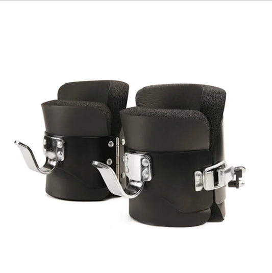 Inversion table ankle cuffs with padded foam lining and metal locking hooks