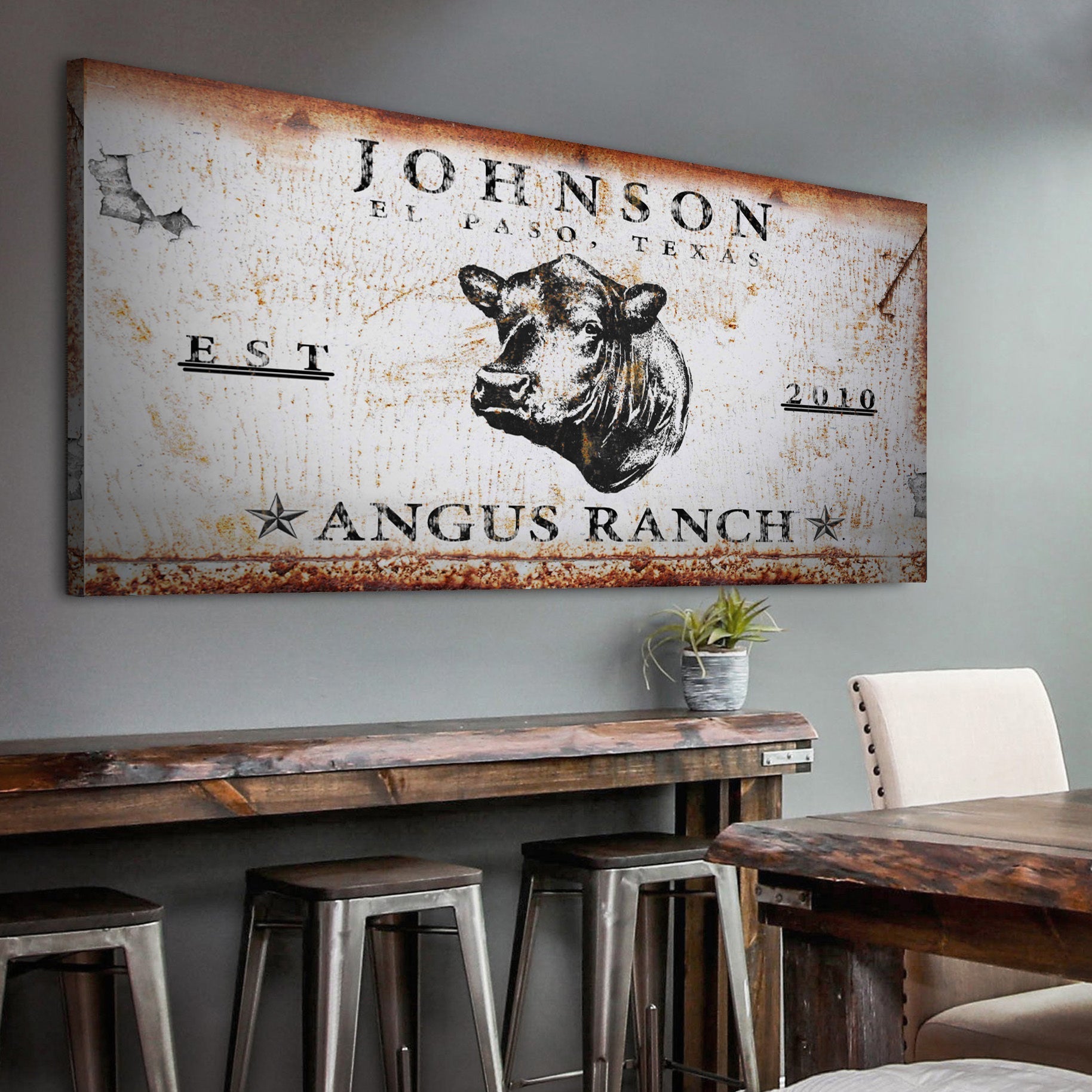 Angus Ranch canvas sign with cattle motif