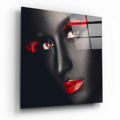 Women's portrait glass wall art in a modern room