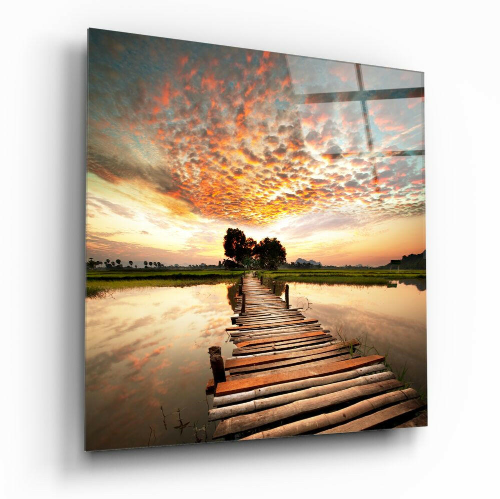 Dock and Landscape coastal glass wall art on a wall