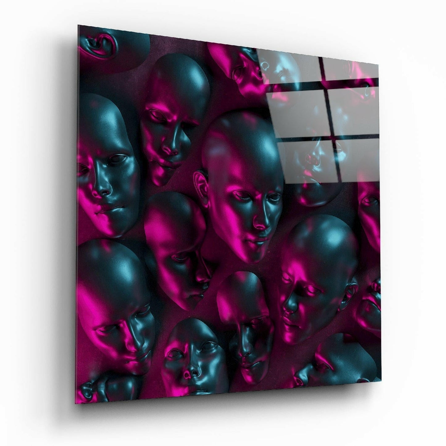 Metallic faces glass wall art on living room wall