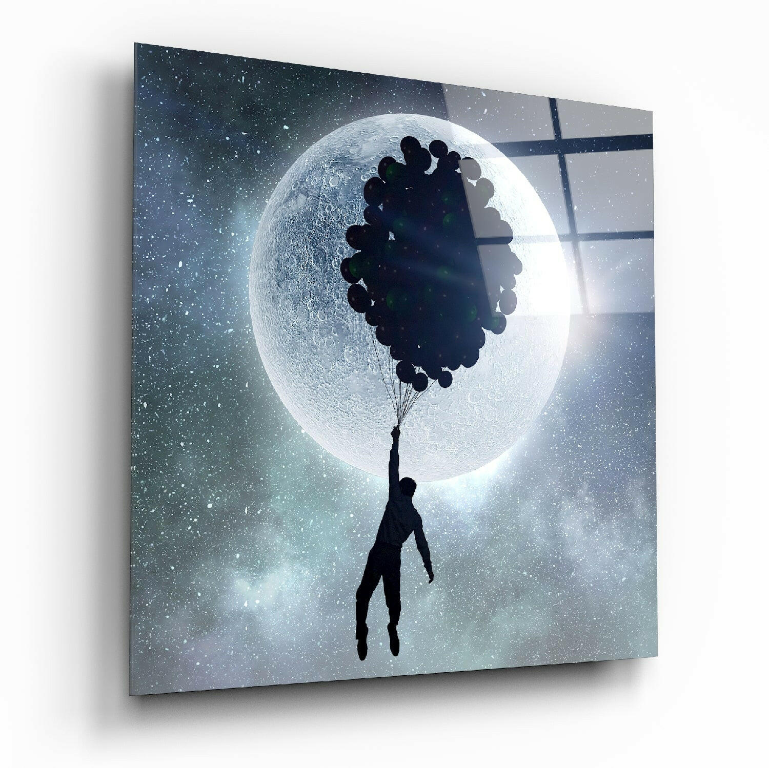 Full moon glass wall art print hanging on a wall