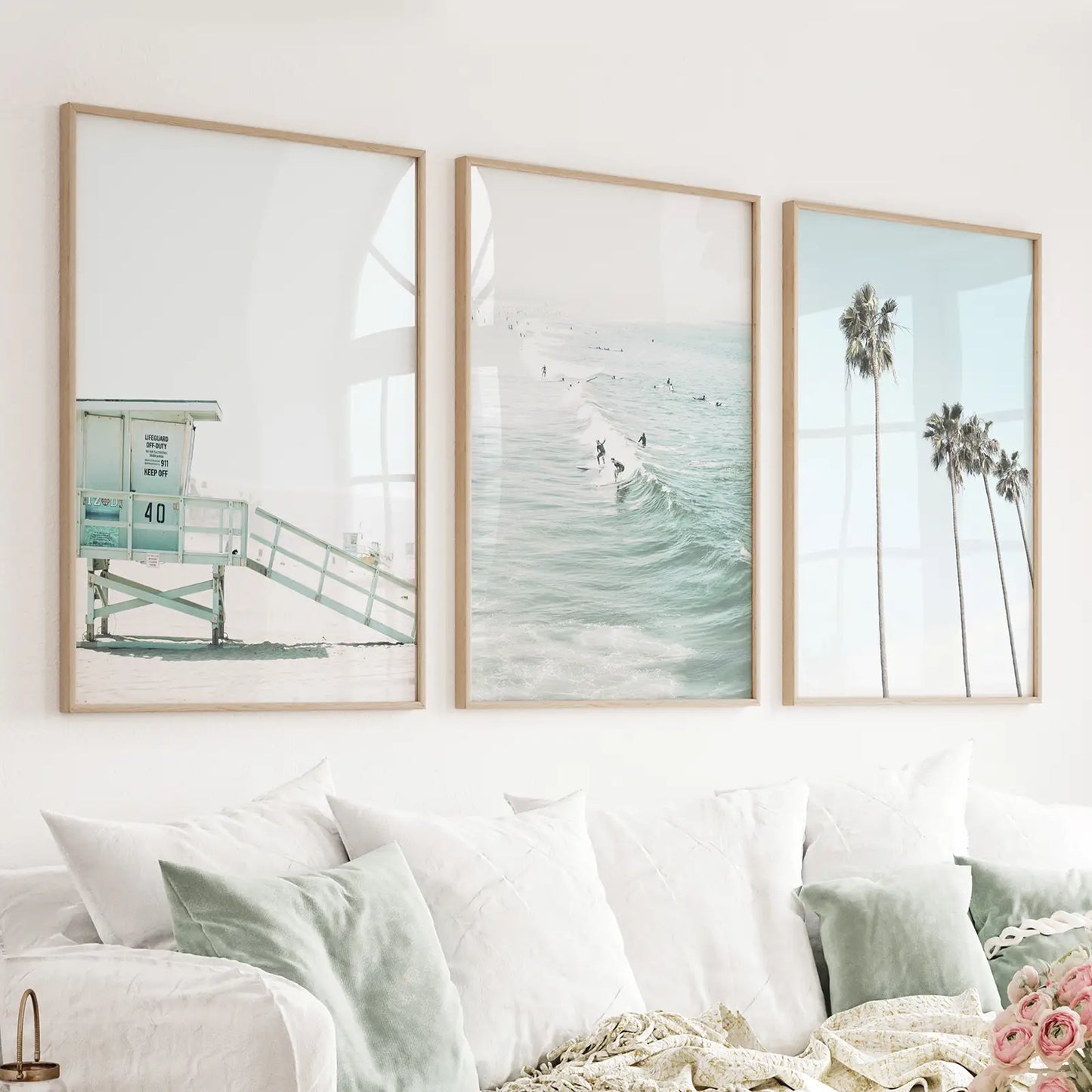 Set of 3 light blue California coastal prints with a lifeguard tower, surfers, and palms