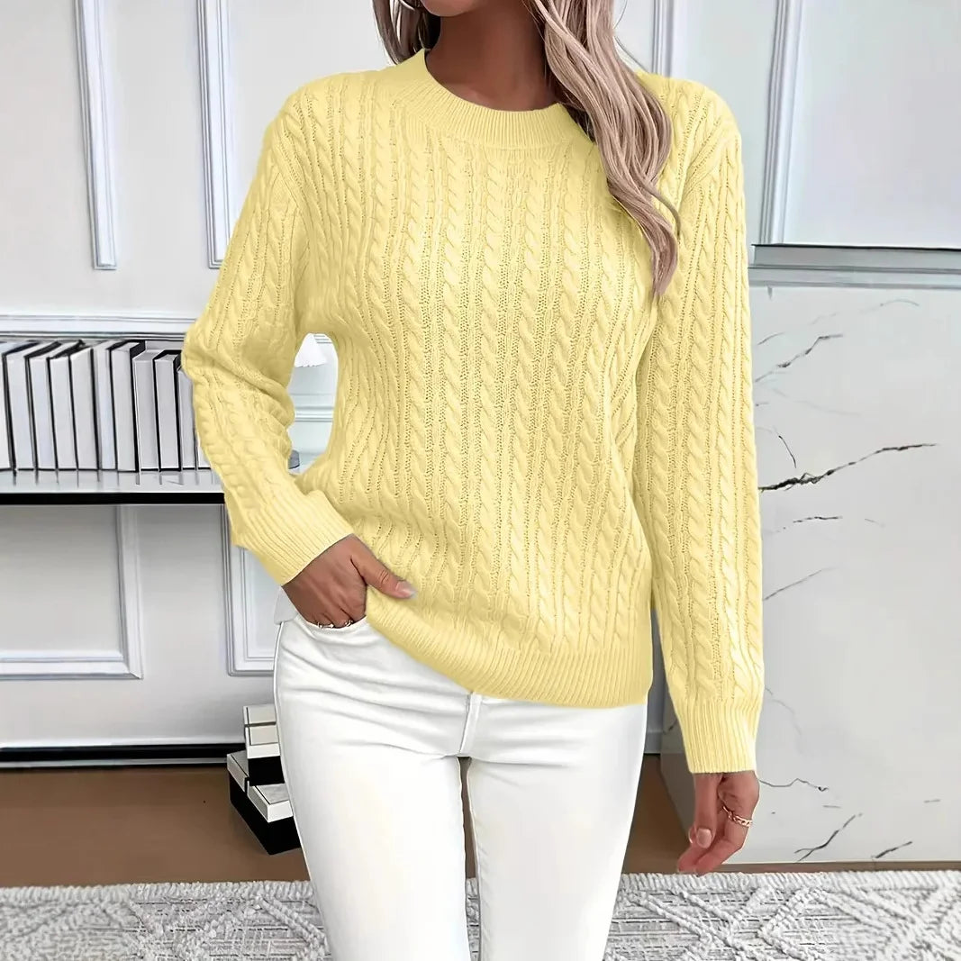 Light Yellow women’s cable-knit pullover sweater shown in a bright, casual outfit