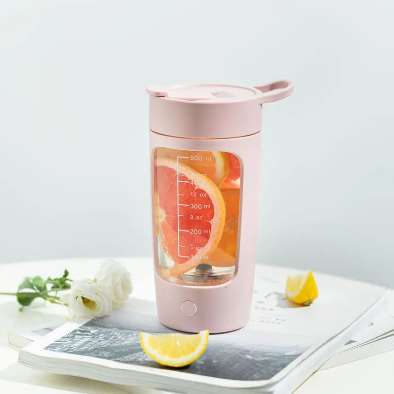 Light coffee automatic mixing sports bottle with citrus slices and visible volume scale