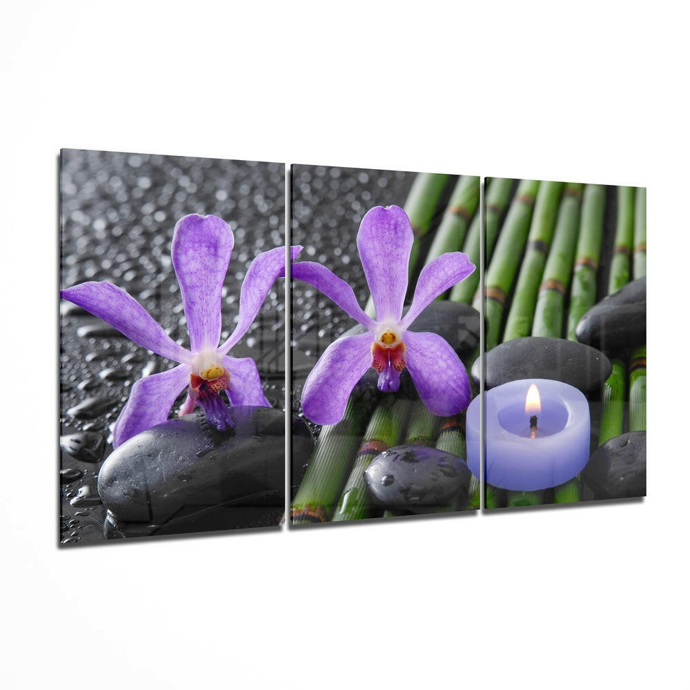 Purple Orchid glass wall art above bedroom headboard