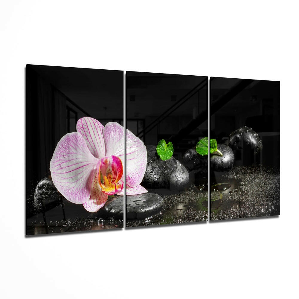 Orchid glass wall art on bedroom accent wall