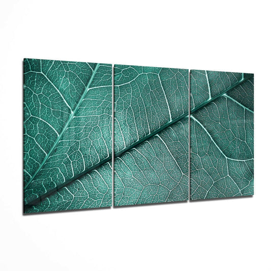 Leaf texture glass wall art hanging on a wall