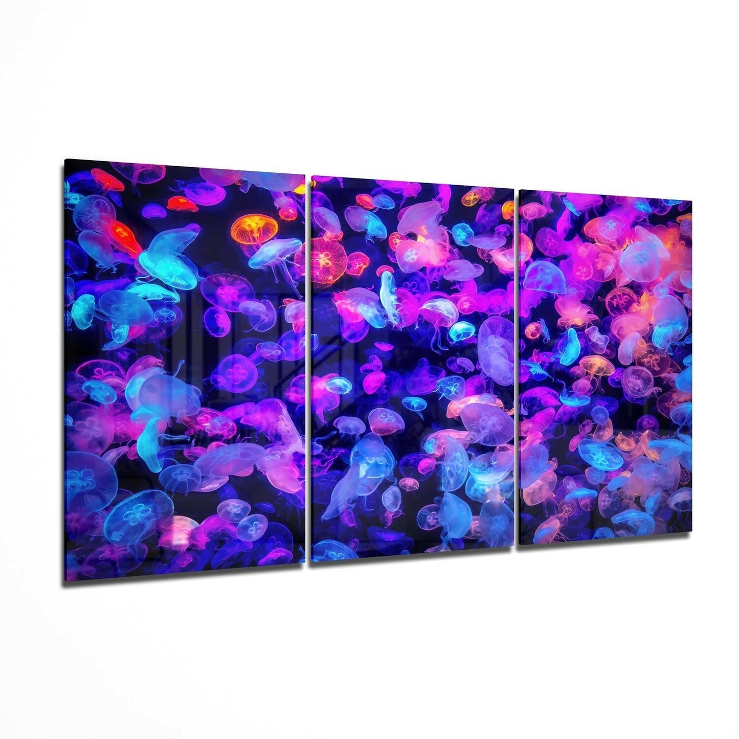Jellyfish glass wall art hanging on a wall