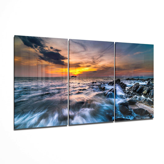 Sunset On The Beach glass wall art displayed on a living room wall