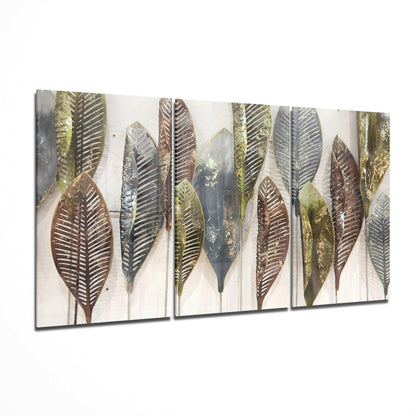 Leaves glass wall art displayed on a living room wall