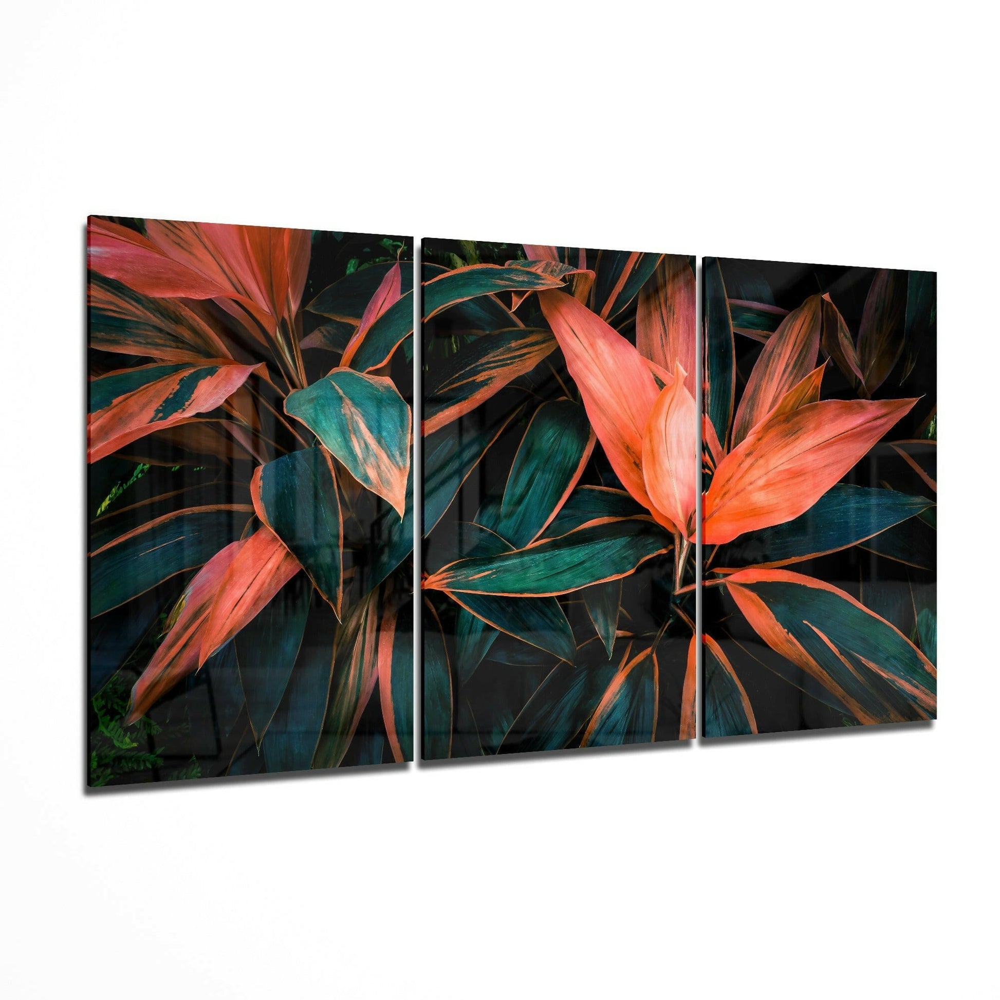 Cordyline flower glass wall art displayed on a living room wall