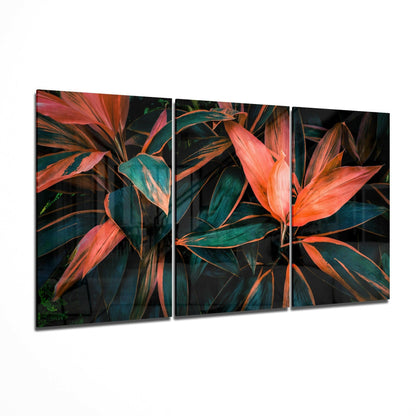 Cordyline flower glass wall art displayed on a living room wall