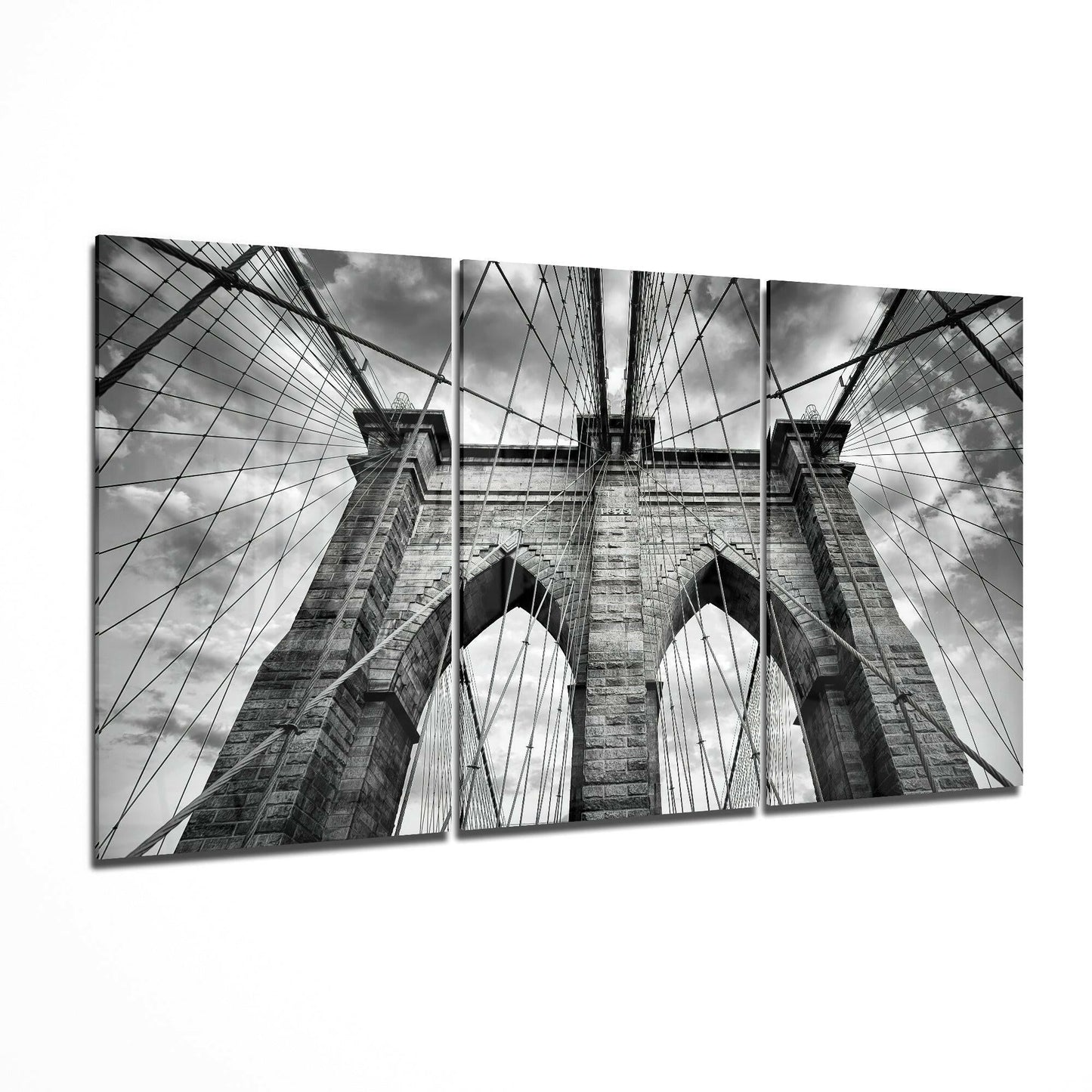 Brooklyn Bridge glass wall art displayed on a living room wall