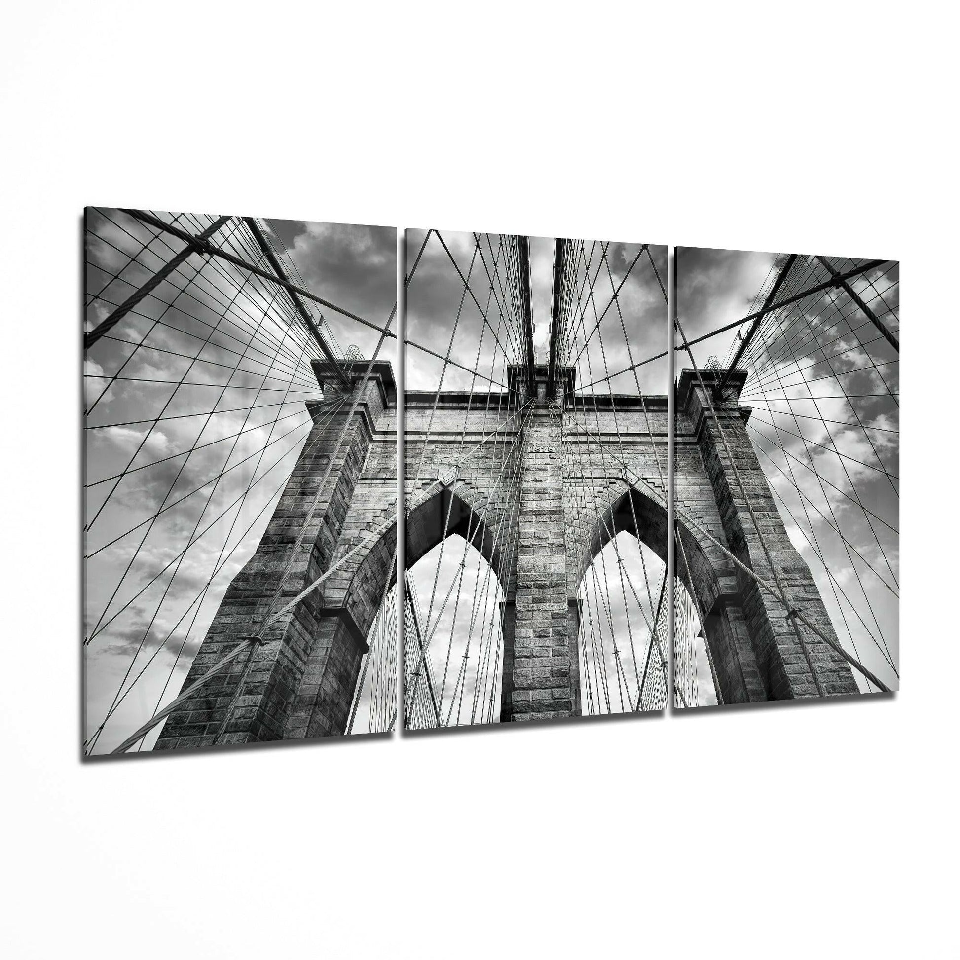 Brooklyn Bridge glass wall art displayed on a living room wall