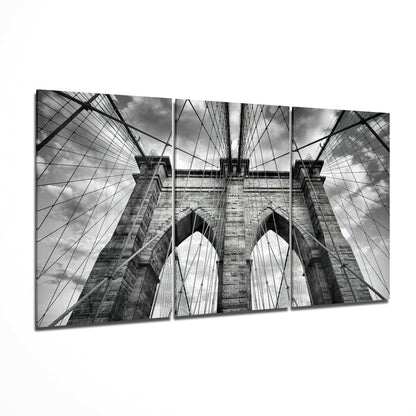Brooklyn Bridge glass wall art displayed on a living room wall