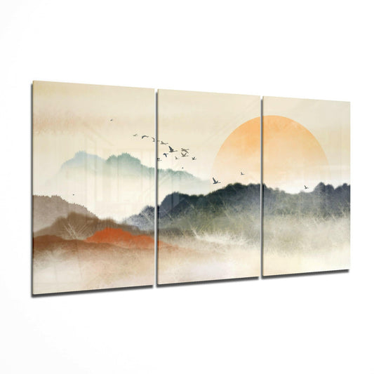 Sunset glass wall art displayed on a living room wall