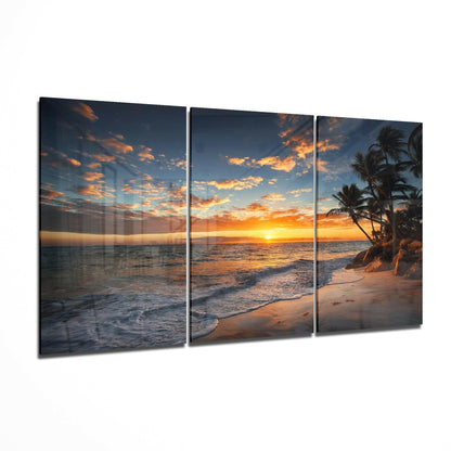 Sunset glass wall art 3-piece set featuring a glowing skyline