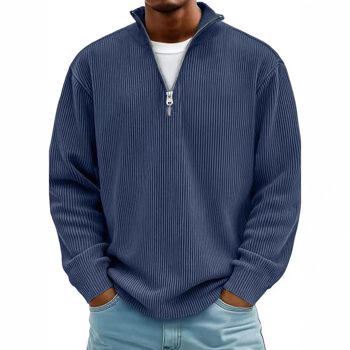 Man wearing a blue ribbed quarter-zip sweater on a white background