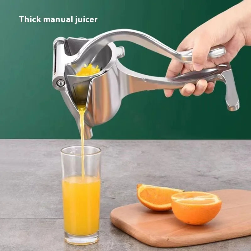Manual citrus juicer extracting orange juice into glass for household use
