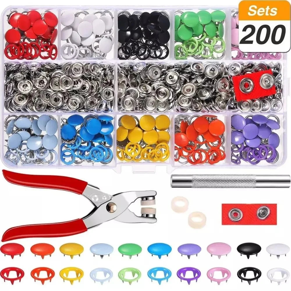 Metal snap fastener kit with colored prong buttons and pliers tool for clothes