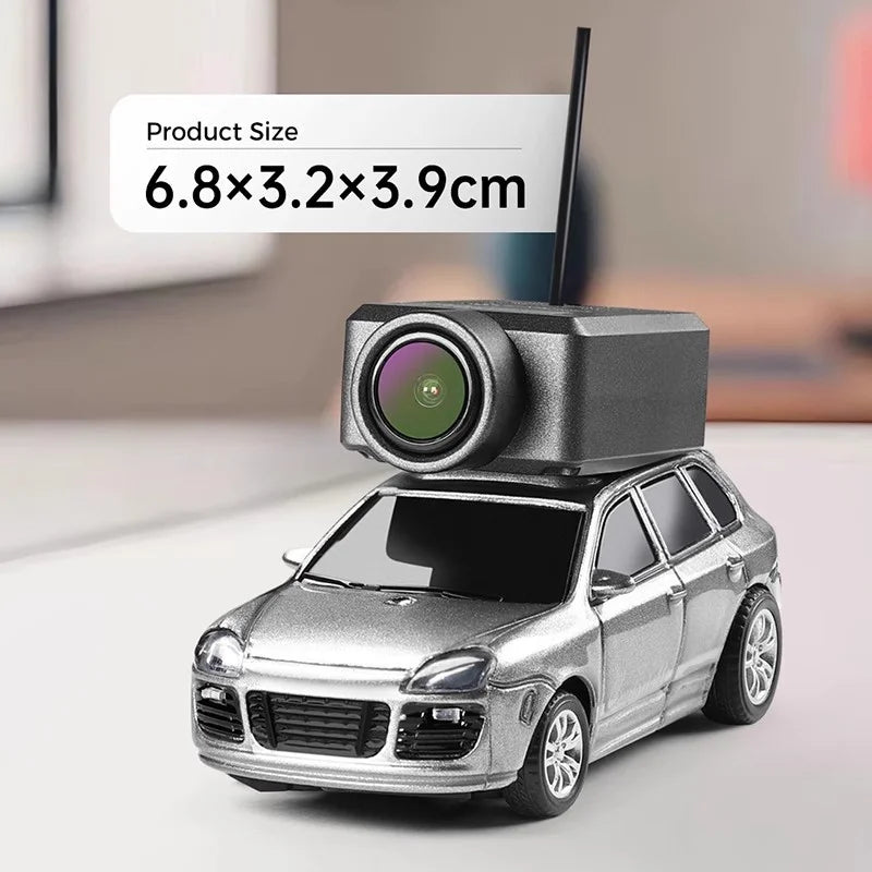 Mini FPV RC car 1:64 scale with WiFi camera on desk showing compact size and silver finish