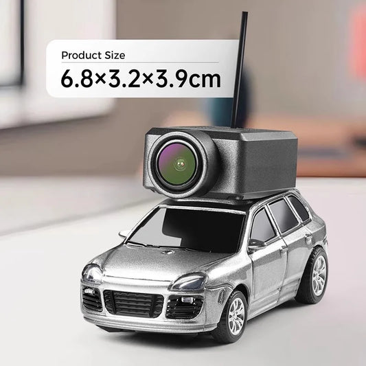 Mini FPV RC car 1:64 scale with WiFi camera on desk showing compact size and silver finish