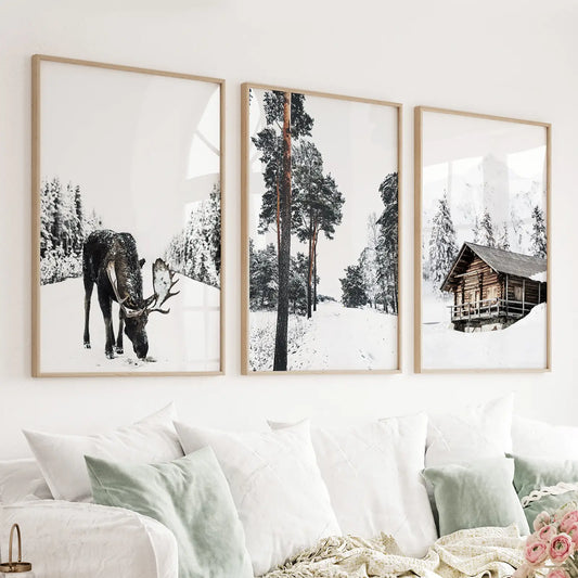 Set of 3 Nordic winter wall art prints with pine forest moose and log cabin