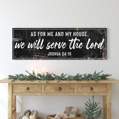 Joshua 24:15 We Will Serve the Lord canvas sign in the black style above a wooden console table