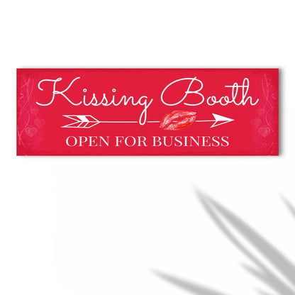 Kissing Booth Open for Business canvas on a white wall, close view