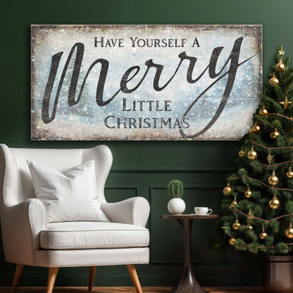 Frosty blue Merry Little Christmas sign canvas shown in a styled room setting, view 3