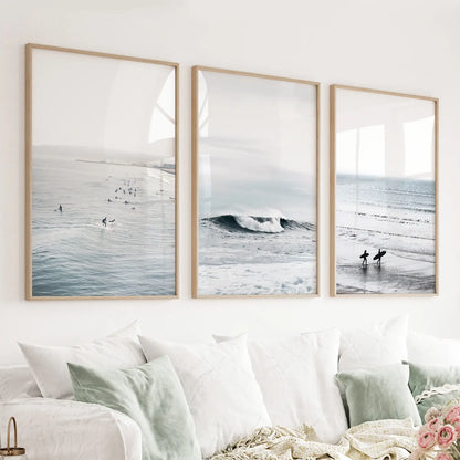 Navy blue surf wall art set of 3 with surfers, ocean waves, and beach
