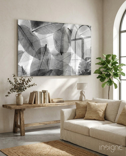 Black and white leaf glass wall art in modern room
