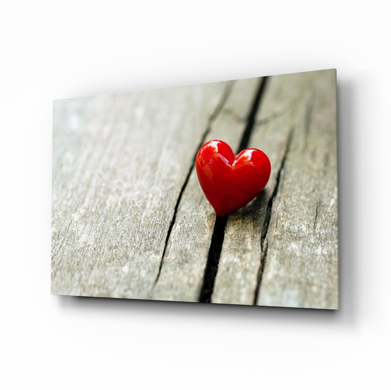Red heart on wood plank glass wall art still life