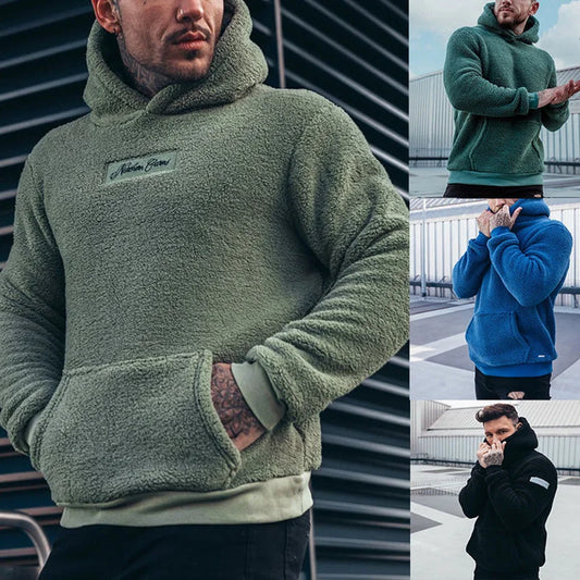 Olive green men’s sherpa hoodie displayed in a casual streetwear look