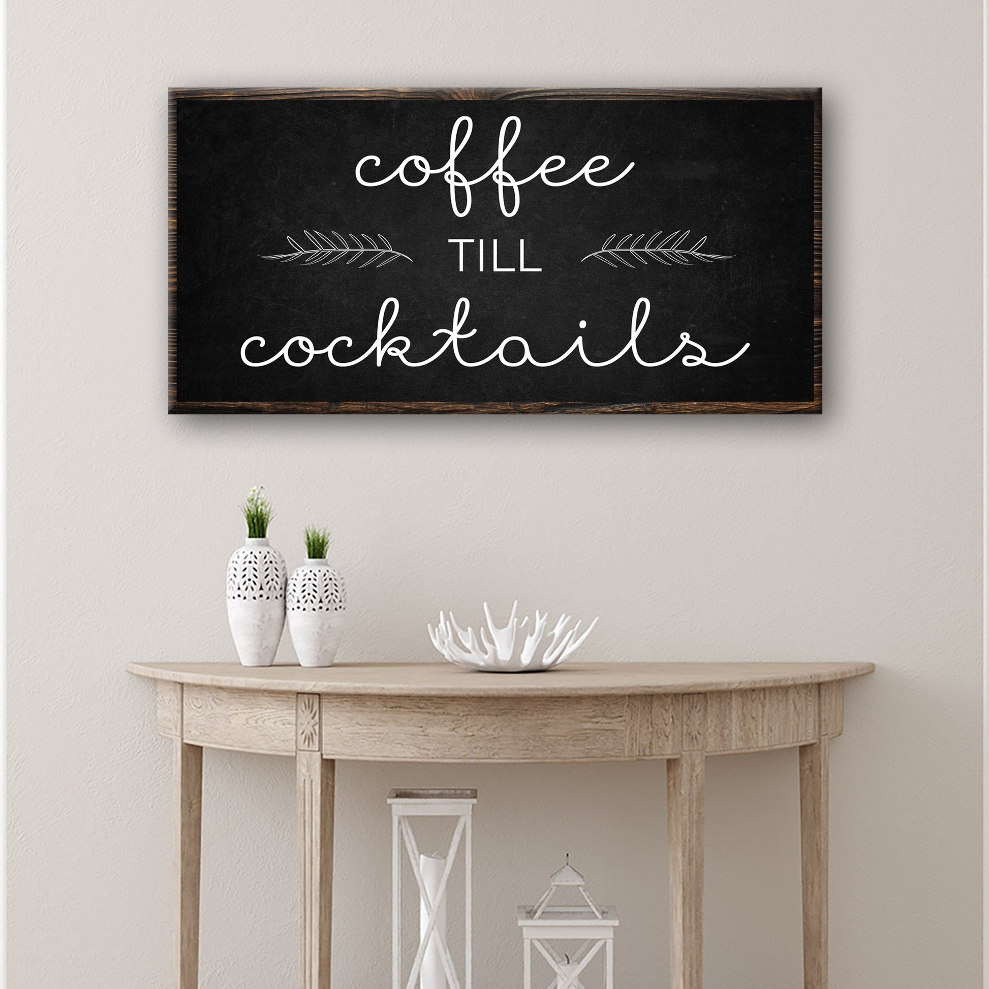 Coffee Till Cocktails bar canvas sign hung on a wall above a home coffee bar