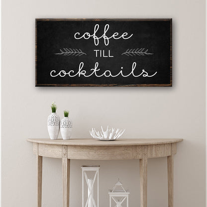 Coffee Till Cocktails bar canvas sign hung on a wall above a home coffee bar