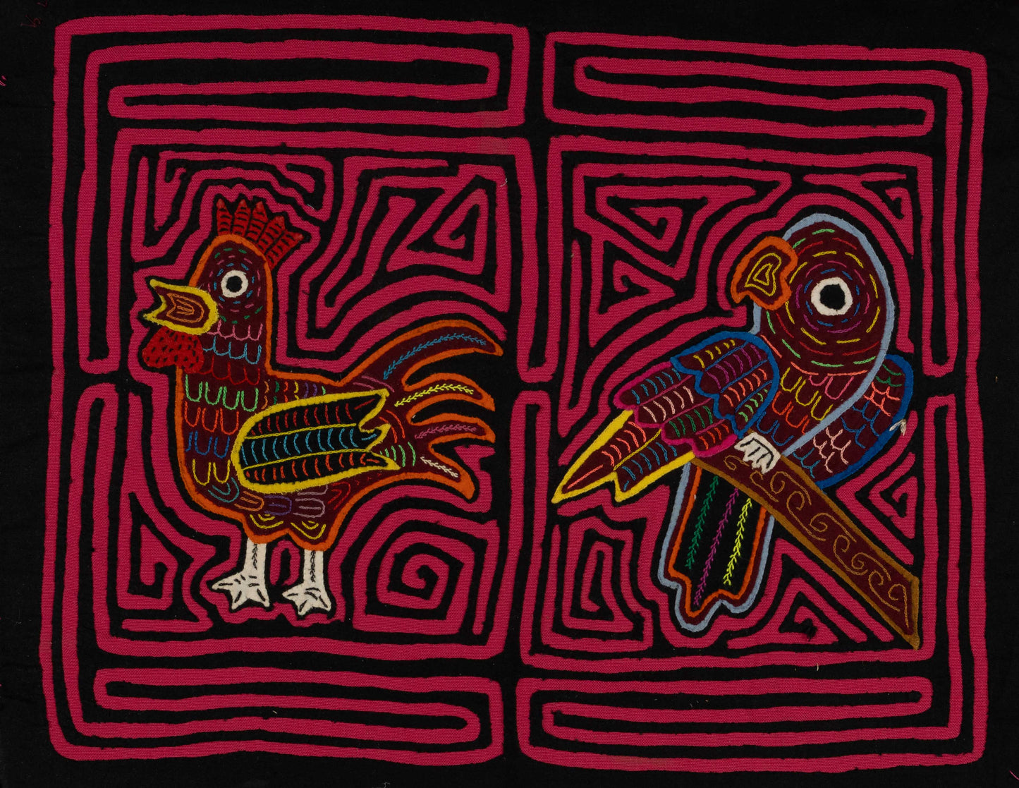 Hand-stitched Panama mola tapestry of a rooster and parrot, colorful folk-art fabric wall hanging