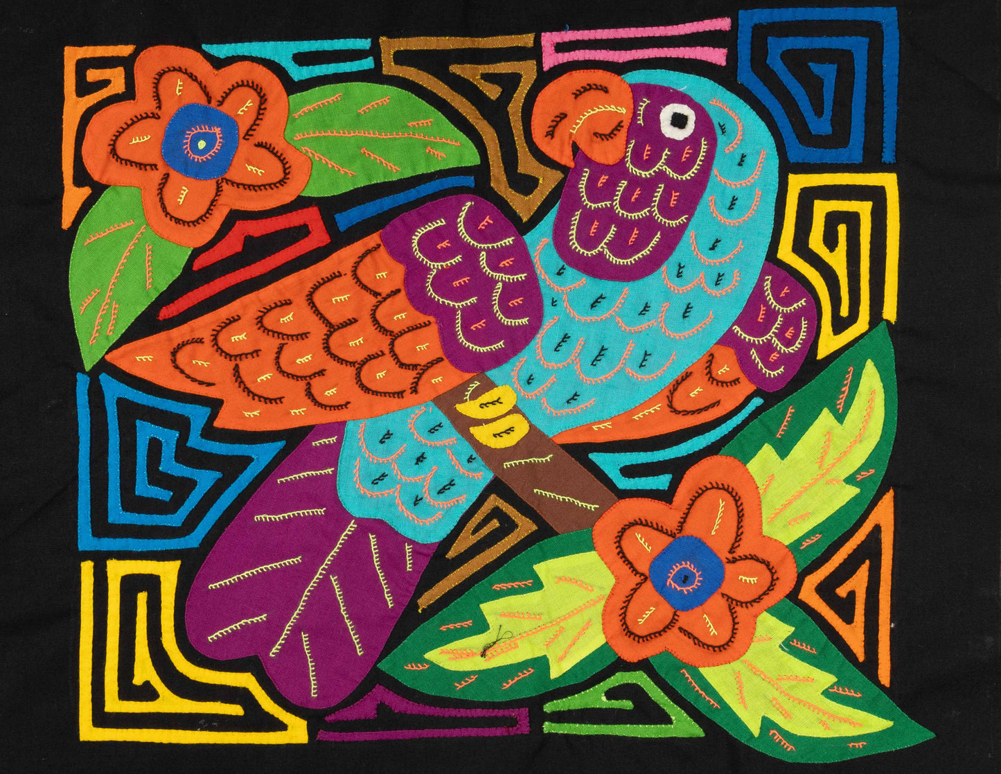 Hand-stitched Panama mola tapestry of an orange, blue and purple parrot, colorful folk-art fabric wall hanging