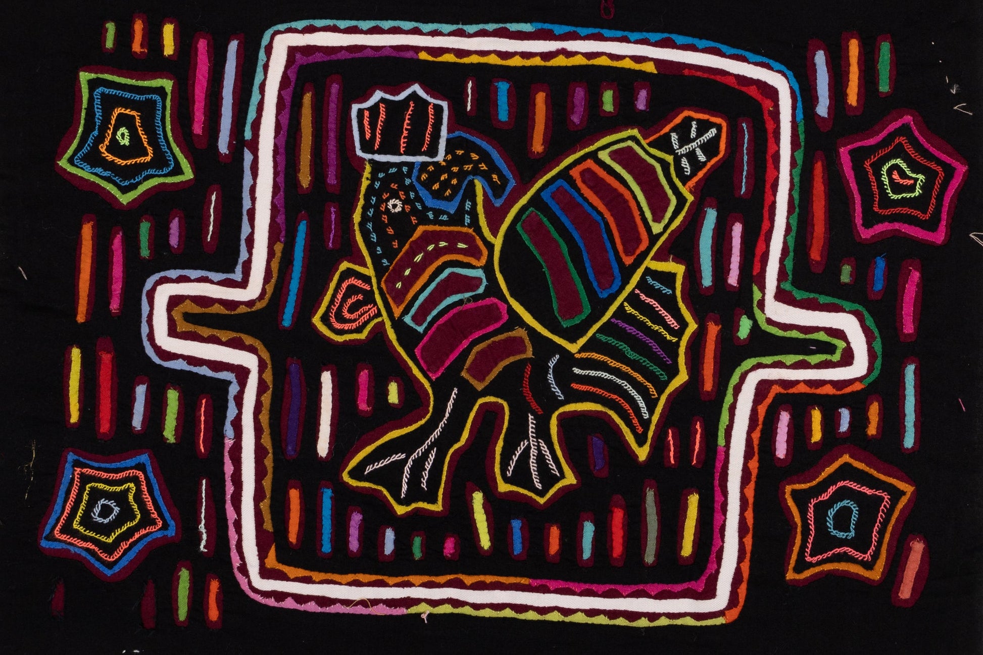 Hand-stitched Panama mola tapestry of a black rooster on rainbow colors, colorful folk-art fabric wall hanging