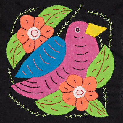 Hand-stitched Panama mola tapestry of a pink and blue seedeater bird, colorful folk-art fabric wall hanging